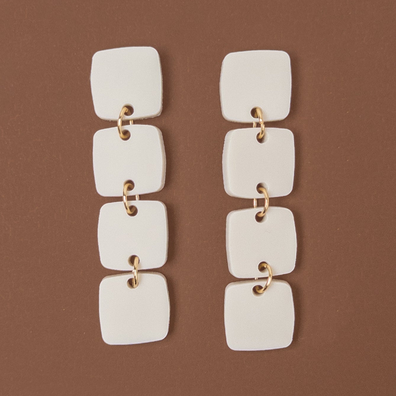Four squares drop beige statement earrings