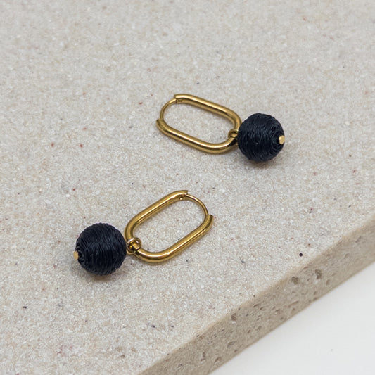 Gold Oval Huggie Earrings with Removable Matte Black Bead Charm