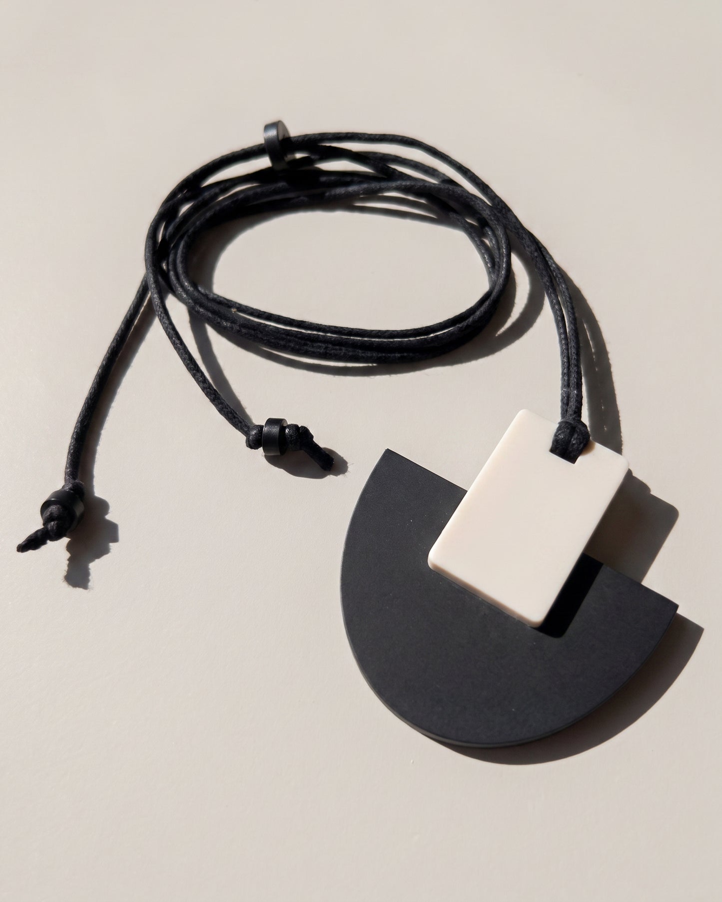 Echo Pendant Necklace - Matte Black and Ivory - Mingled