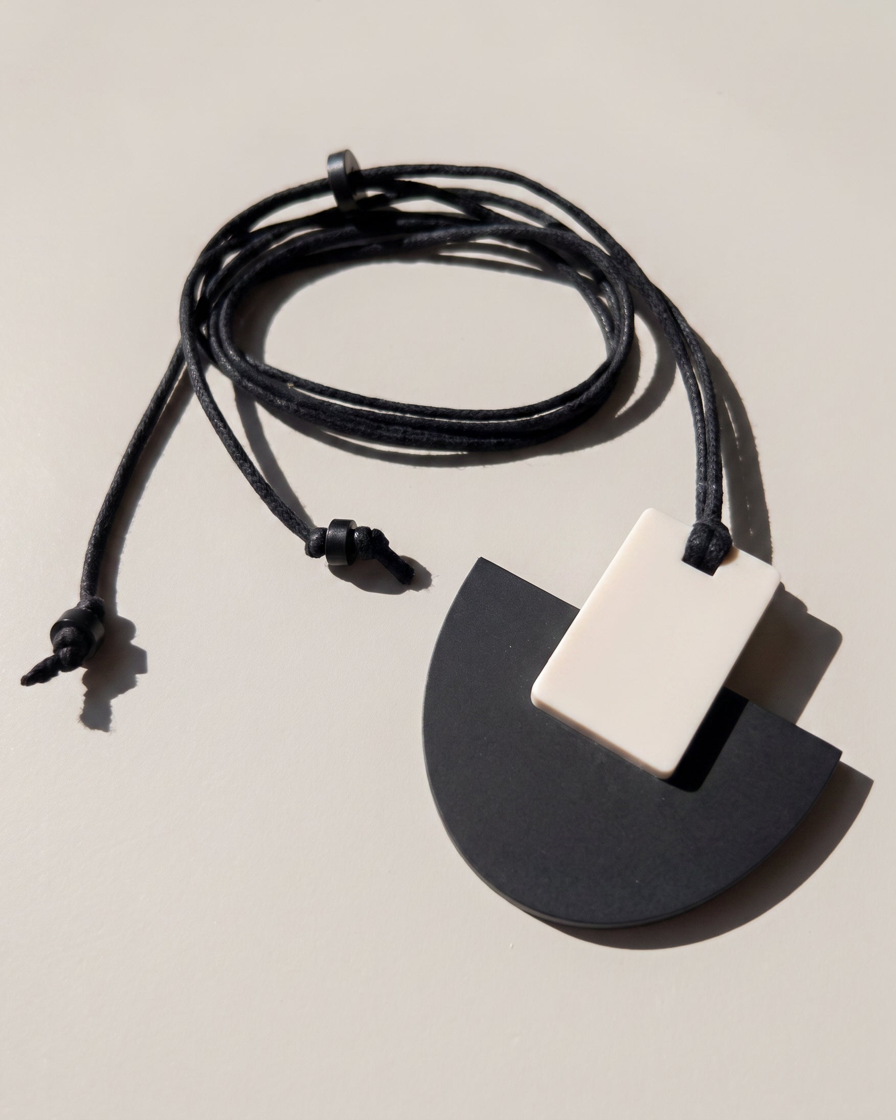 Echo Pendant Necklace - Matte Black and Ivory - Mingled