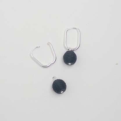 Silver Oval Huggie Earrings with Removable Matte Black Bead Charm - Mingled
